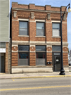 1133 MAIN STREET, a Neoclassical/Beaux Arts small office building, built in Oconto, Wisconsin in 1910.