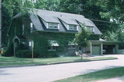 2157 RIVERSIDE AVE, a Dutch Colonial Revival small office building, built in Marinette, Wisconsin in 1888.