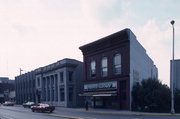 1812 HALL AVE, a Commercial Vernacular small retail building, built in Marinette, Wisconsin in 1883.