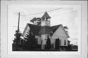3949 CTH DD, a Queen Anne church, built in Grover, Wisconsin in 1877.