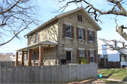 8447 W LISBON AVE, a Greek Revival house, built in Milwaukee, Wisconsin in 1875.