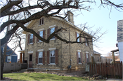 8447 W LISBON AVE, a Greek Revival house, built in Milwaukee, Wisconsin in 1875.