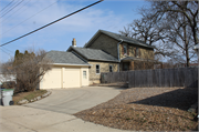 8447 W LISBON AVE, a Greek Revival house, built in Milwaukee, Wisconsin in 1875.