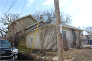 8447 W LISBON AVE, a Greek Revival house, built in Milwaukee, Wisconsin in 1875.