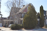 1409 - 1409A WASHINGTON ST, a Queen Anne duplex/two-flat, built in Manitowoc, Wisconsin in 1911.