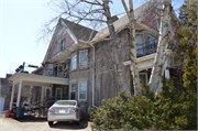 1409 - 1409A WASHINGTON ST, a Queen Anne duplex/two-flat, built in Manitowoc, Wisconsin in 1911.