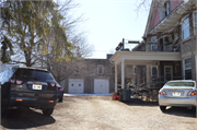 1409-1409A WASHINGTON ST, a Queen Anne carriage house, built in Manitowoc, Wisconsin in 1911.
