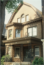 825-827 N CASS ST, a Dutch Colonial Revival house, built in Milwaukee, Wisconsin in 1904.