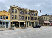524-528 W NATIONAL AVE, a Colonial Revival/Georgian Revival retail building, built in Milwaukee, Wisconsin in 1902.
