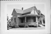1428 LOGAN AVE, a Queen Anne house, built in Marinette, Wisconsin in 1892.