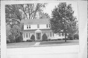 644 MARIETTA AVE, a Dutch Colonial Revival house, built in Marinette, Wisconsin in 1925.