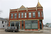 1124-1128 OREGON ST, a Queen Anne small retail building, built in Oshkosh, Wisconsin in 1894.