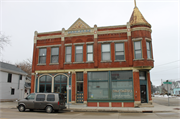 1124-1128 OREGON ST, a Queen Anne retail building, built in Oshkosh, Wisconsin in 1894.