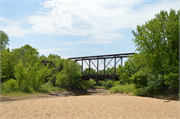 Former railroad line over east channel of Wisconsin River, a NA (unknown or not a building) overhead truss bridge, built in Mazomanie, Wisconsin in 1911.