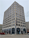 103 W COLLEGE AVE, a Late Gothic Revival large office building, built in Appleton, Wisconsin in 1932.