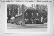 2157 RIVERSIDE AVE, a Dutch Colonial Revival small office building, built in Marinette, Wisconsin in 1888.