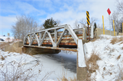 Stettin Drive over Artus Creek, a NA (unknown or not a building) pony truss bridge, built in Stettin, Wisconsin in 1939.