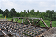Stettin Drive over Artus Creek, a NA (unknown or not a building) pony truss bridge, built in Stettin, Wisconsin in 1939.