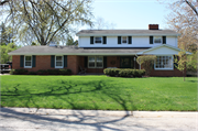631 SUNSET CIRCLE, a Colonial Revival/Georgian Revival house, built in Allouez, Wisconsin in 1963.