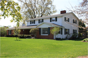 631 SUNSET CIRCLE, a Colonial Revival/Georgian Revival house, built in Allouez, Wisconsin in 1963.