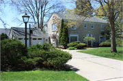 644 SUNSET CIRCLE, a Colonial Revival/Georgian Revival house, built in Allouez, Wisconsin in 1940.