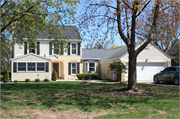 655 SUNSET CIRCLE, a Colonial Revival/Georgian Revival house, built in Allouez, Wisconsin in 1943.
