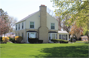 655 SUNSET CIRCLE, a Colonial Revival/Georgian Revival house, built in Allouez, Wisconsin in 1943.
