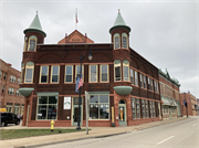 1821 HALL AVE, a Queen Anne retail building, built in Marinette, Wisconsin in 1890.