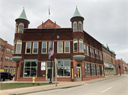 1821 HALL AVE, a Queen Anne large retail building, built in Marinette, Wisconsin in 1890.