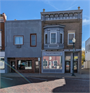 17 W MAIN ST, a Queen Anne small retail building, built in Evansville, Wisconsin in 1903.