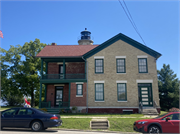 5117 4TH AVE, a Gabled Ell light house, built in Kenosha, Wisconsin in 1866.