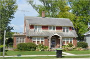 619 7th St. 619 7th St., a Dutch Colonial Revival house, built in Kiel, Wisconsin in 1929.