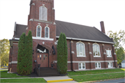 312 E 9TH ST, a Late Gothic Revival church, built in Marshfield, Wisconsin in 1925.