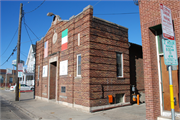Italian Workmen's Club, a Building.