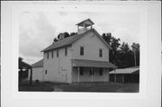 SOUTHEAST CORNER OF POLK AND CLAY, a Greek Revival city/town/village hall/auditorium, built in Harris, Wisconsin in 1899.