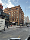 301 W WISCONSIN AVE, a Romanesque Revival retail building, built in Milwaukee, Wisconsin in 1892.