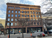 301 W WISCONSIN AVE, a Romanesque Revival retail building, built in Milwaukee, Wisconsin in 1892.