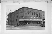 6 MAIN ST, a Romanesque Revival large retail building, built in Montello, Wisconsin in 1909.