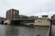 Over the Milwaukee River between N. Young Street and E. Pittsburgh Avenue, a NA (unknown or not a building) bridge, built in Milwaukee, Wisconsin in 1982.