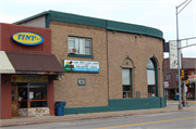 101 E Wall St (B), a Neoclassical/Beaux Arts small retail building, built in Eagle River, Wisconsin in 1924.