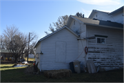 13828 West USH 14, a Gabled Ell house, built in Evansville, Wisconsin in 1880.