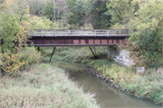 Elroy-Sparta State Trail, just SE of STH 82-Lincoln St intersection, a NA (unknown or not a building) steel beam or plate girder bridge, built in Plymouth, Wisconsin in 1873.