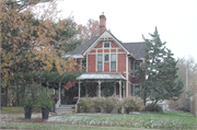 518 E MAIN ST, a Queen Anne house, built in Reedsburg, Wisconsin in 1891.