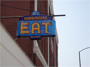 131 S WASHINGTON ST, a Commercial Vernacular small retail building, built in Green Bay, Wisconsin in 1940.