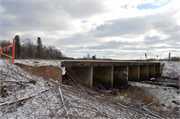 Wozny Road (abandoned) over Totagatic River, a NA (unknown or not a building) dam/lock, built in Frog Creek, Wisconsin in 1953.