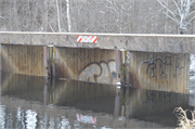 Wozny Road (abandoned) over Totagatic River, a NA (unknown or not a building) dam/lock, built in Frog Creek, Wisconsin in 1953.