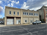 C. 209 S WATER, a Commercial Vernacular garage, built in Stoughton, Wisconsin in .