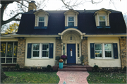 2011 VAN HISE AVE, a Dutch Colonial Revival house, built in Madison, Wisconsin in 1915.