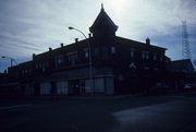 125-127 W OAK ST, a Queen Anne large retail building, built in Sparta, Wisconsin in 1896.