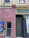 111 W MILWAUKEE ST, a Italianate small retail building, built in Janesville, Wisconsin in 1869.